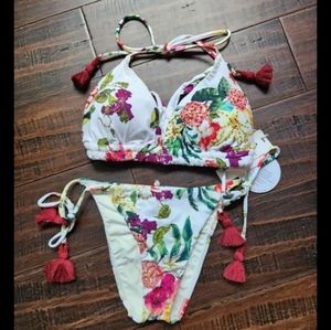 PQ Bikini Top is D cup, Bottom is size small Brazilian cut style